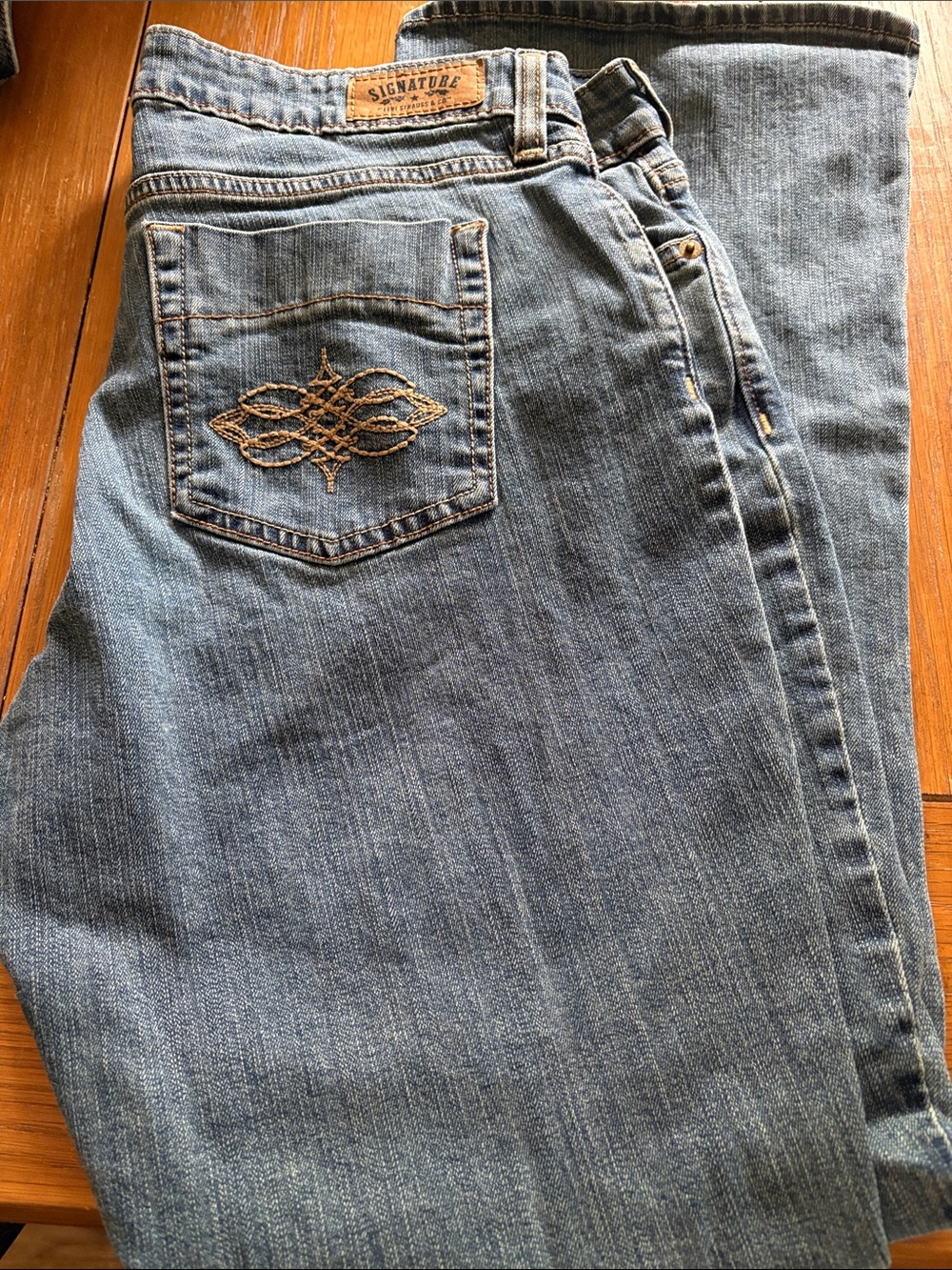 Signature Light Blue Denim Jeans with Tan Embroidered Pocket